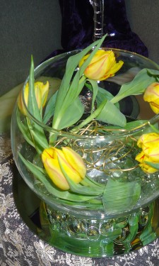 Tulips in goldfish bowl with gold wire decoration