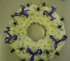 White wreath with blue iris