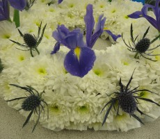 White wreath with blue iris