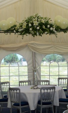Balloon arch and ivory silk flower centre piece