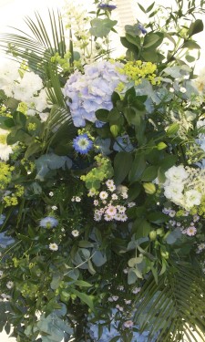 Large arrangement supended from marquee frame with Hydrangea, ivory gerbera & September flower