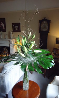 Oriental lilies, monstera leaves and sisal at Crug Glas