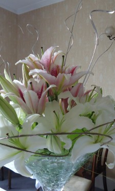 Oriental lilies with flexi grass loops and silver ting